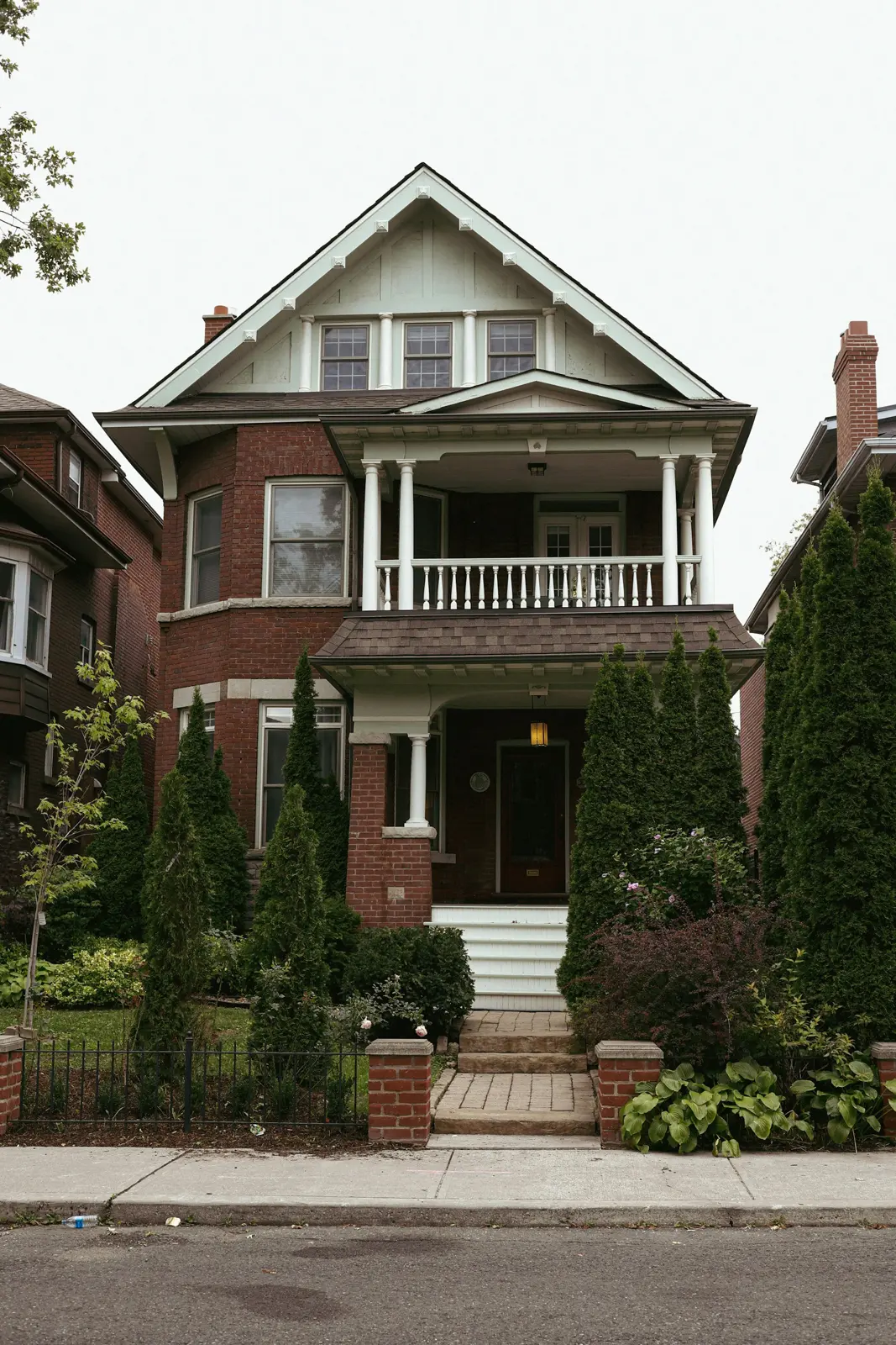Brick Edwardian house with a two-storey porch